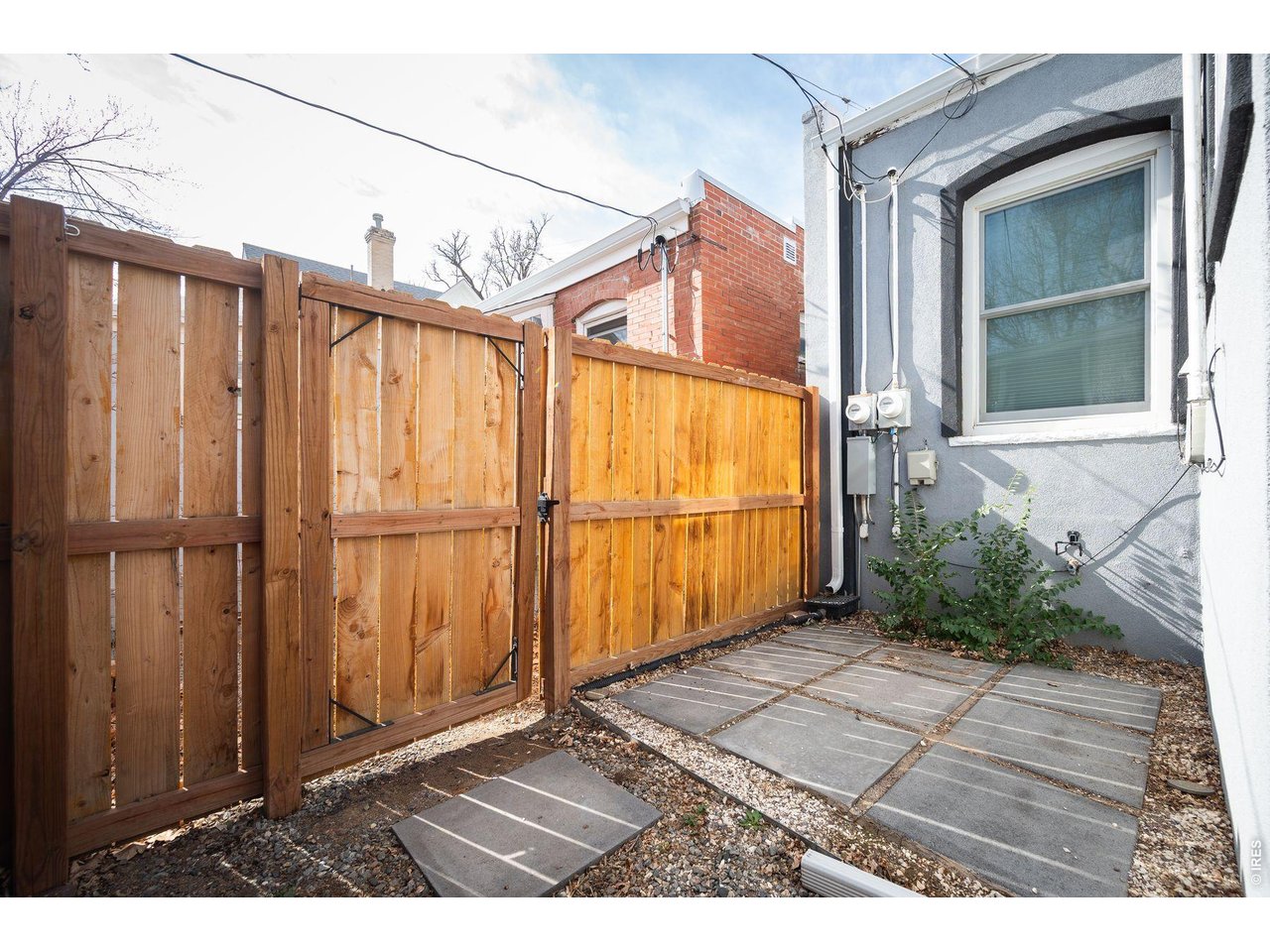 1070 Cook Street Denver, CO 80206 - Photo 23 of 35 a view of a house with a wooden wall