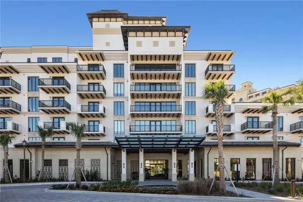 a front view of a building with balcony