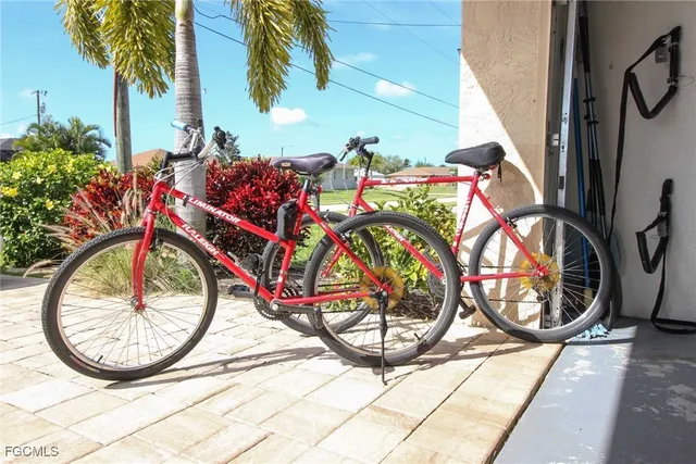 a view of a swimming pool with lounge chair