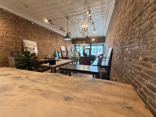 a view of a patio with chairs next to a yard