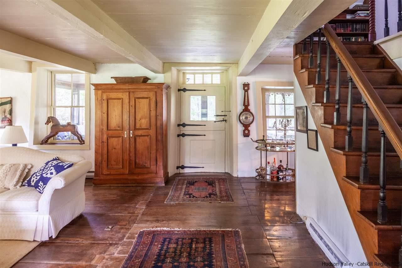 347 Old Powdermill Road Saugerties, NY 12477 - Photo 11 of 35 a view of an entryway with wooden floor and windows