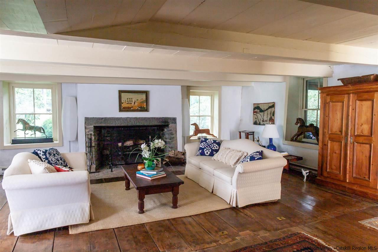 347 Old Powdermill Road Saugerties, NY 12477 - Photo 12 of 35 a living room with furniture and a fireplace