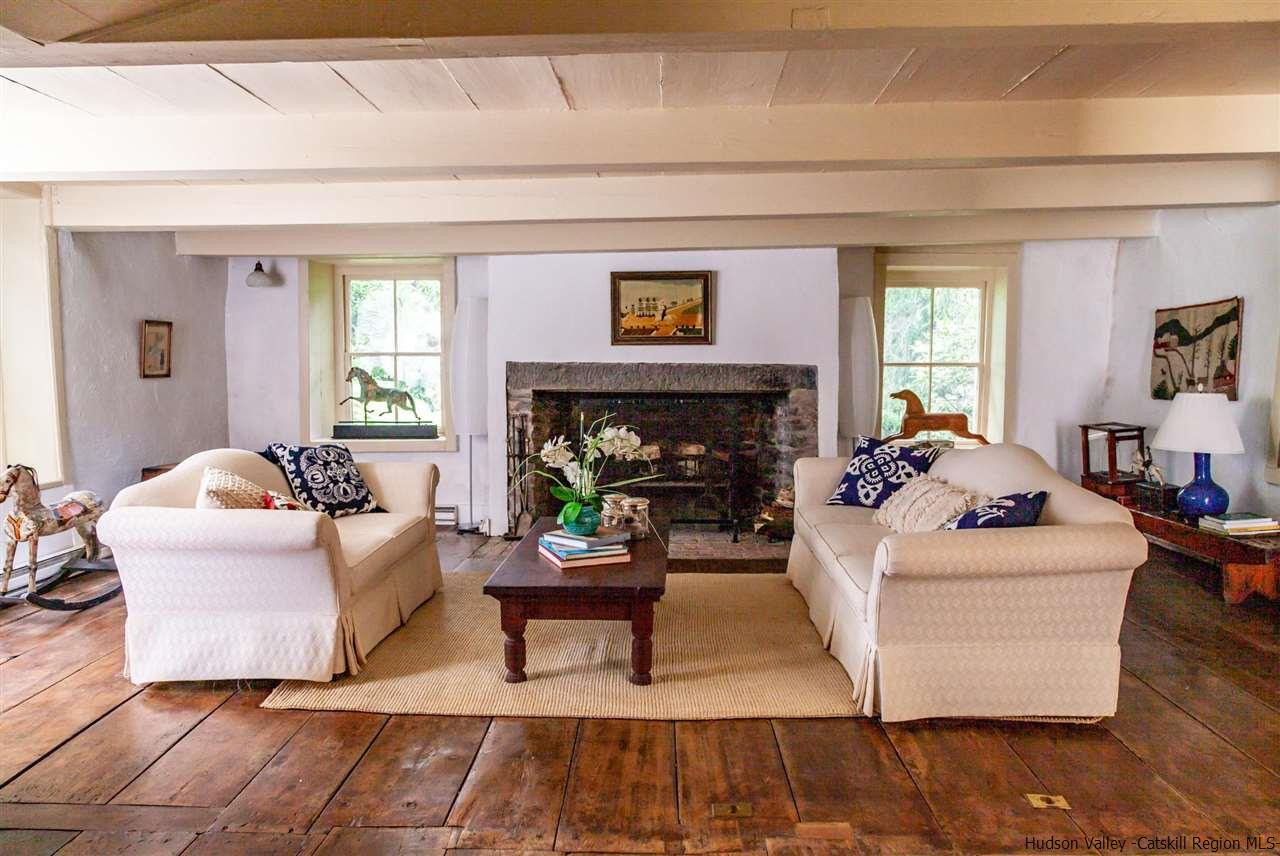 347 Old Powdermill Road Saugerties, NY 12477 - Photo 13 of 35 a living room with furniture and a fireplace