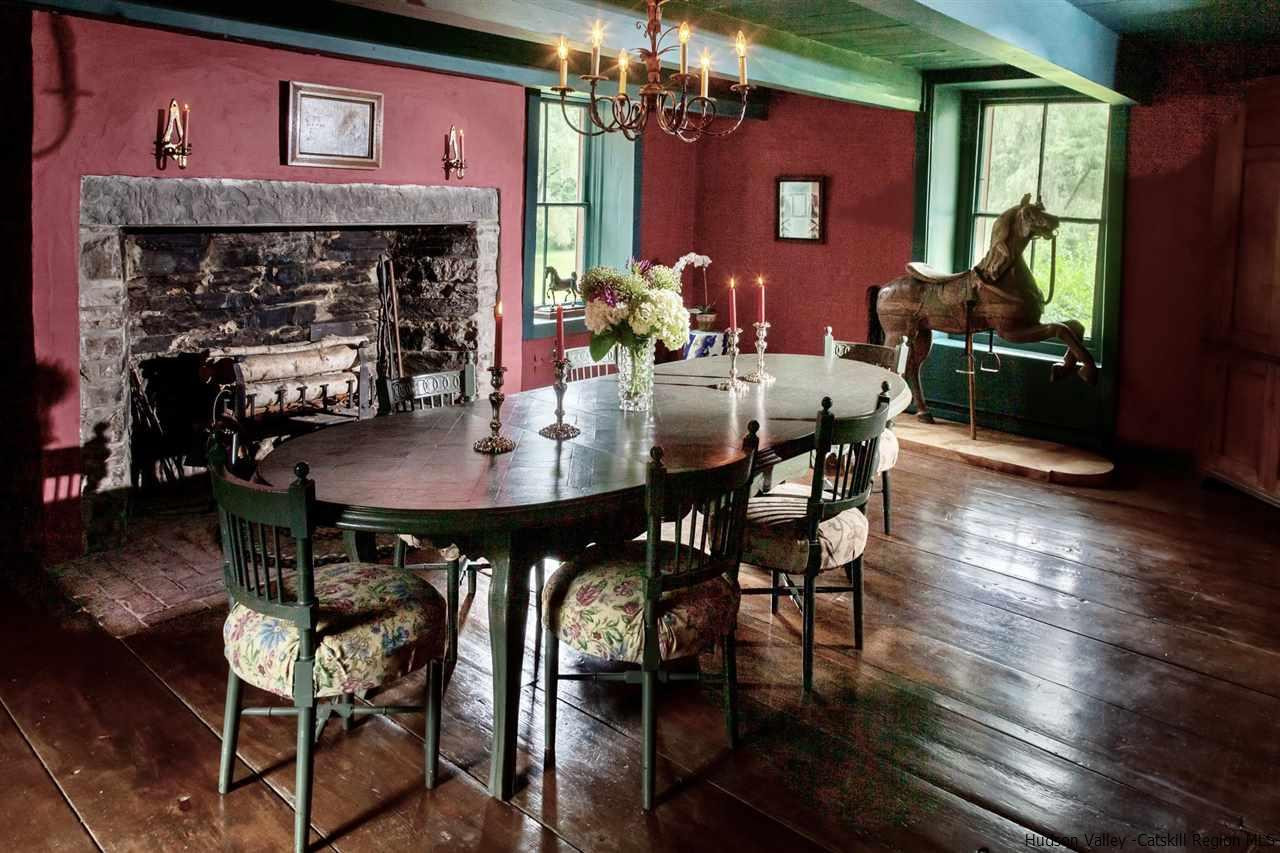 347 Old Powdermill Road Saugerties, NY 12477 - Photo 14 of 35 a view of a dining room with furniture and wooden floor