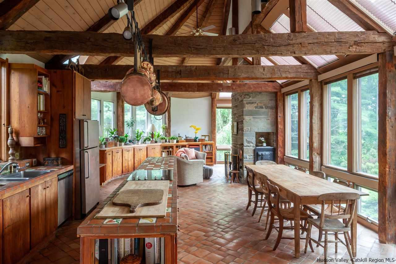 347 Old Powdermill Road Saugerties, NY 12477 - Photo 17 of 35 a view of a patio with a table and chairs