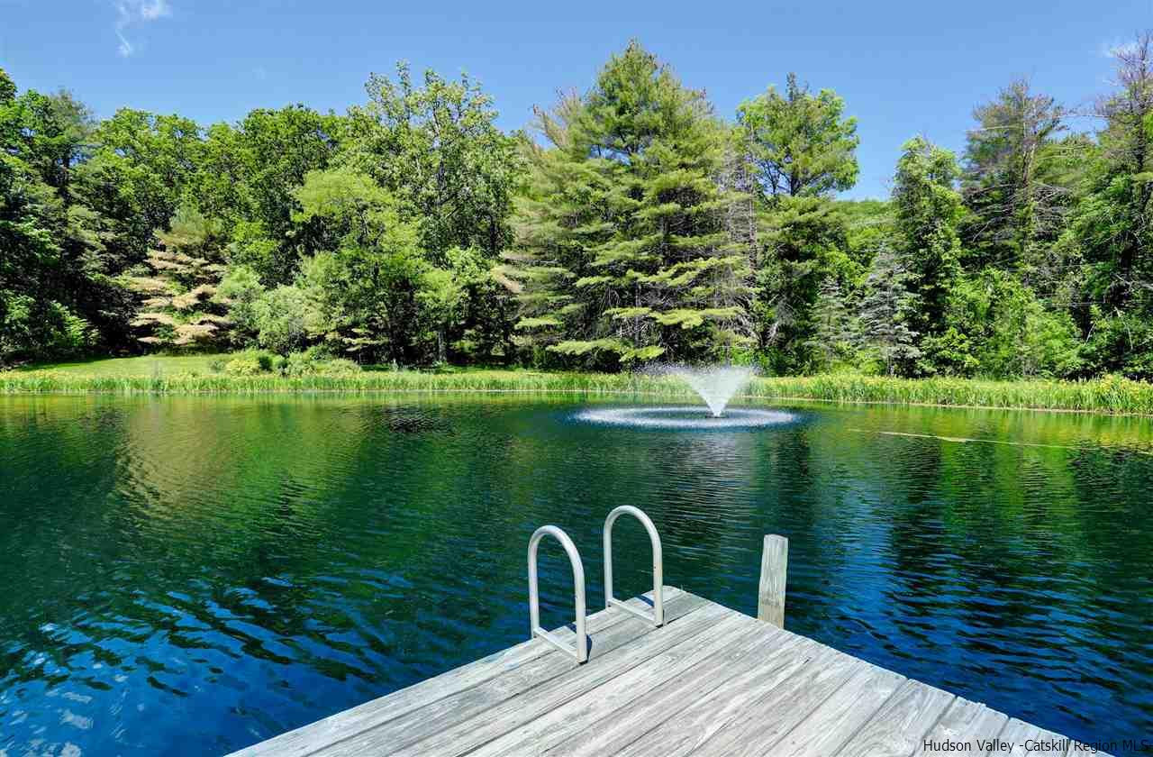 347 Old Powdermill Road Saugerties, NY 12477 - Photo 31 of 35 a view of a lake with a yard