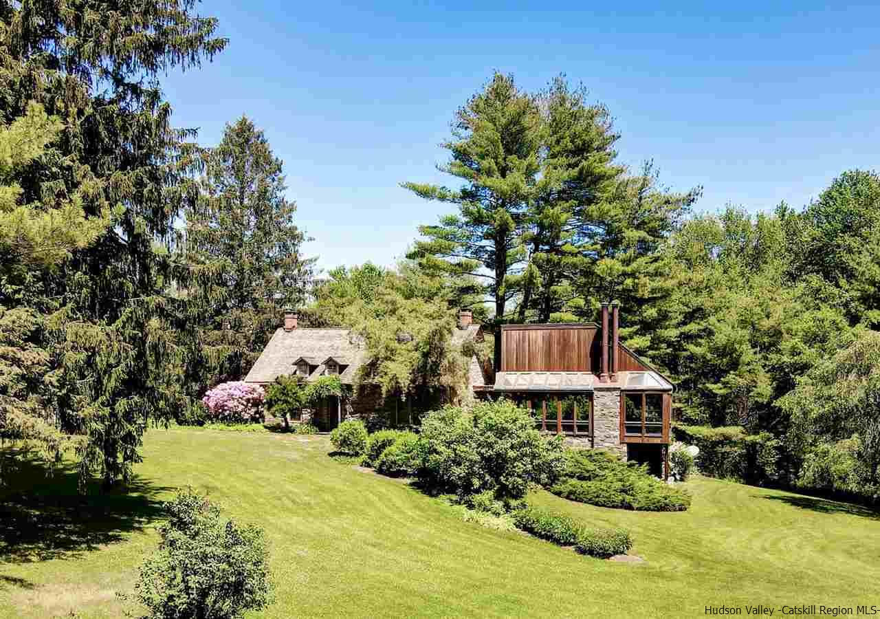 347 Old Powdermill Road Saugerties, NY 12477 - Photo 5 of 35 a yellow and red house with a garden