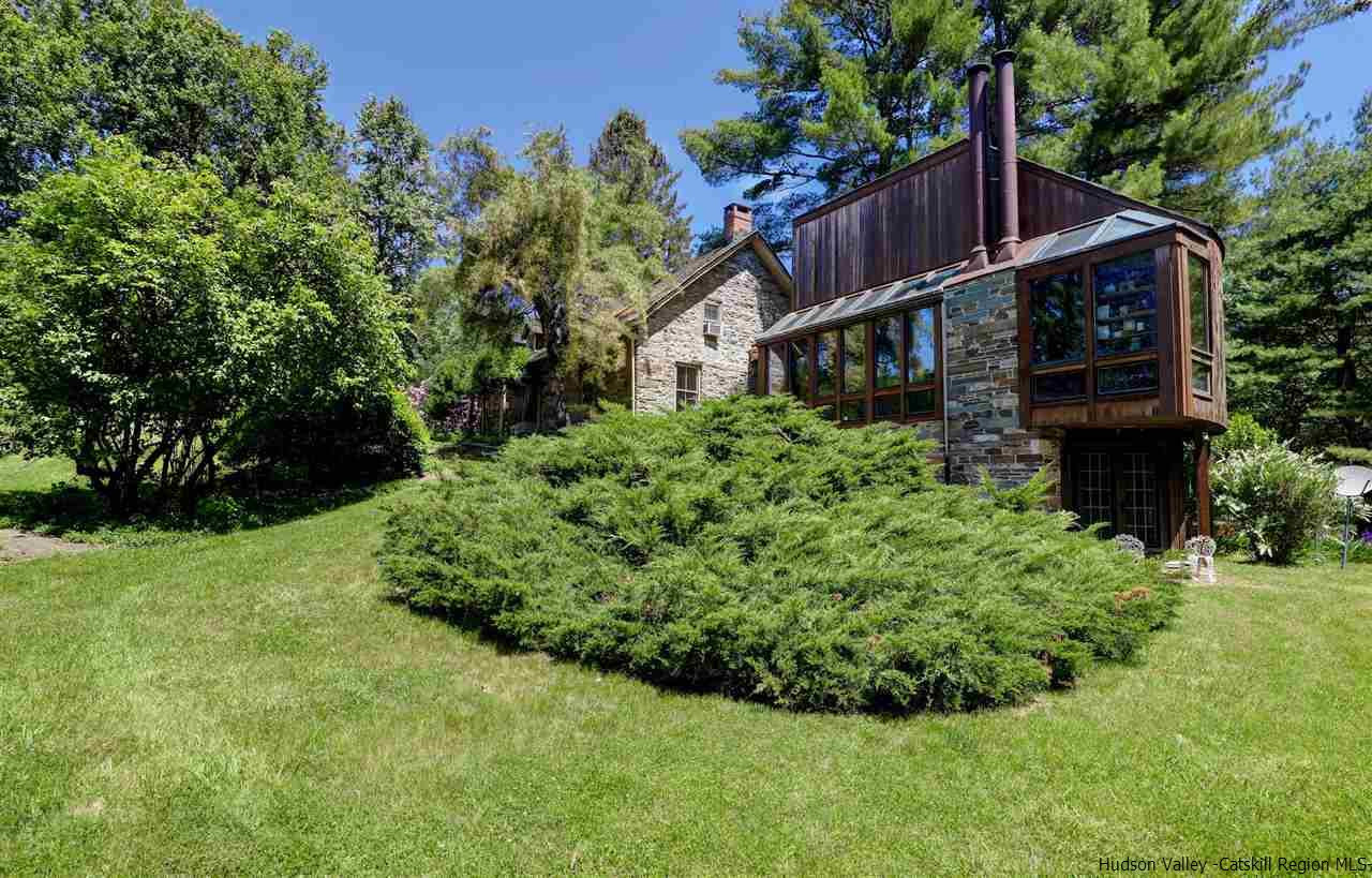 347 Old Powdermill Road Saugerties, NY 12477 - Photo 6 of 35 a view of a house with a yard and plants