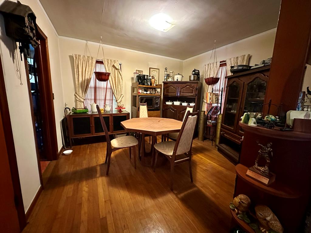 3042 Colonial Drive Columbus, GA 31903 - Photo 11 of 29 a view of a dining room with furniture and wooden floor