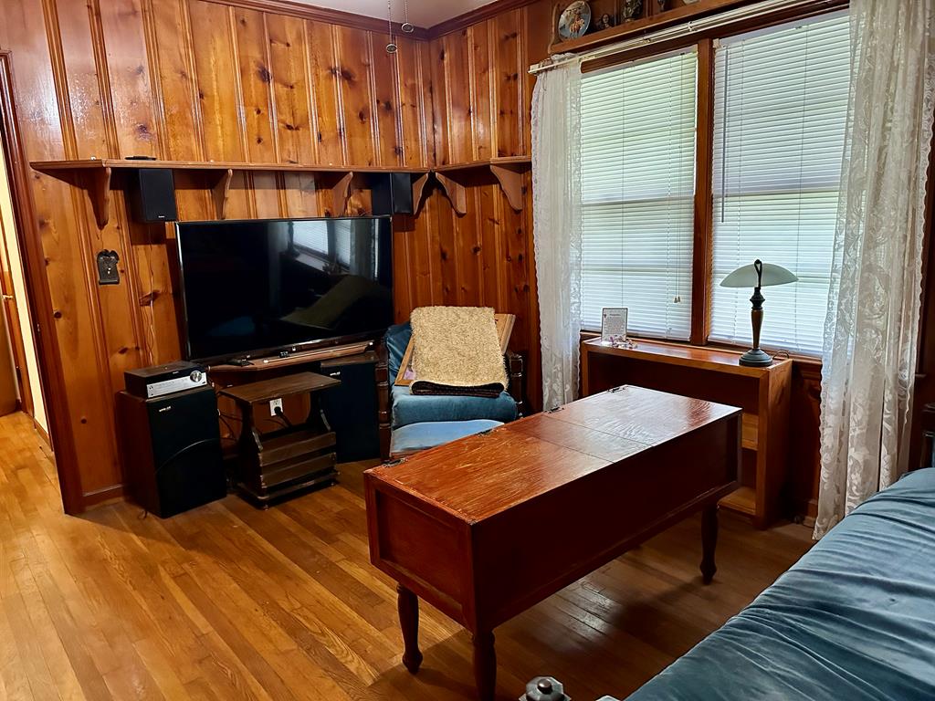 3042 Colonial Drive Columbus, GA 31903 - Photo 17 of 29 a room with wooden floor and furniture