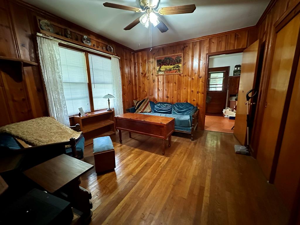 3042 Colonial Drive Columbus, GA 31903 - Photo 18 of 29 a living room with furniture and a chandelier