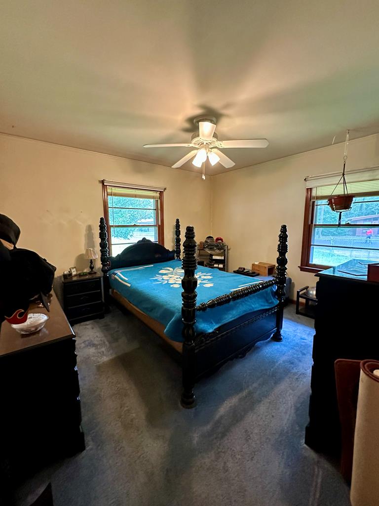 3042 Colonial Drive Columbus, GA 31903 - Photo 19 of 29 a living room with furniture and a chandelier