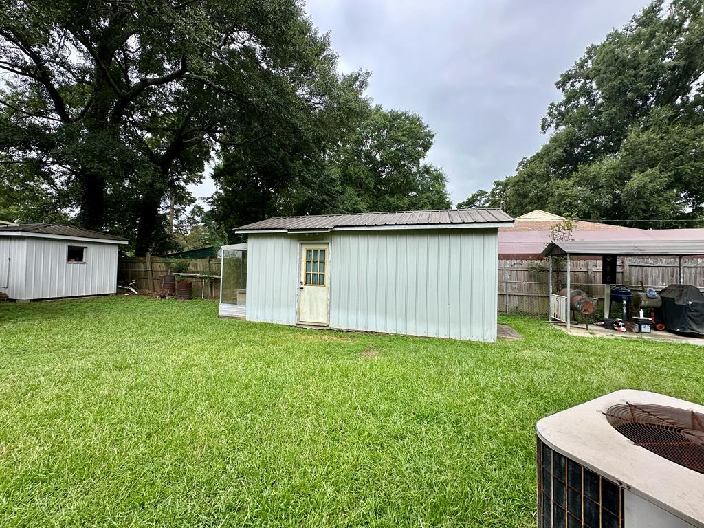 3042 Colonial Drive Columbus, GA 31903 - Photo 25 of 29 a view of a backyard with a garden