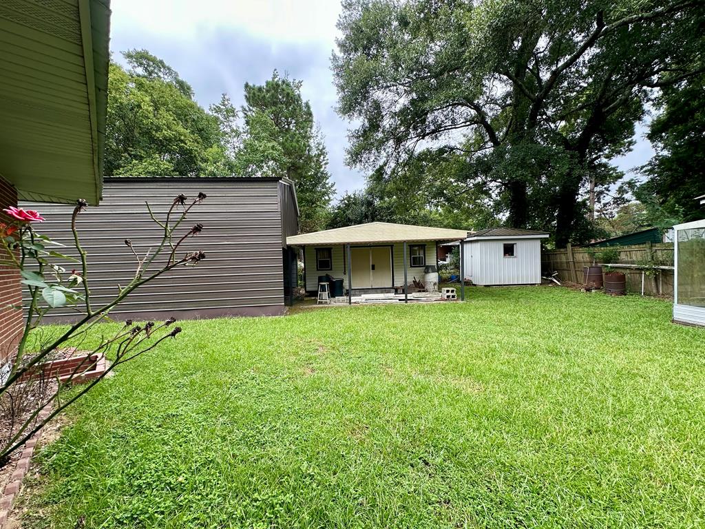 3042 Colonial Drive Columbus, GA 31903 - Photo 26 of 29 a front view of house with a garden