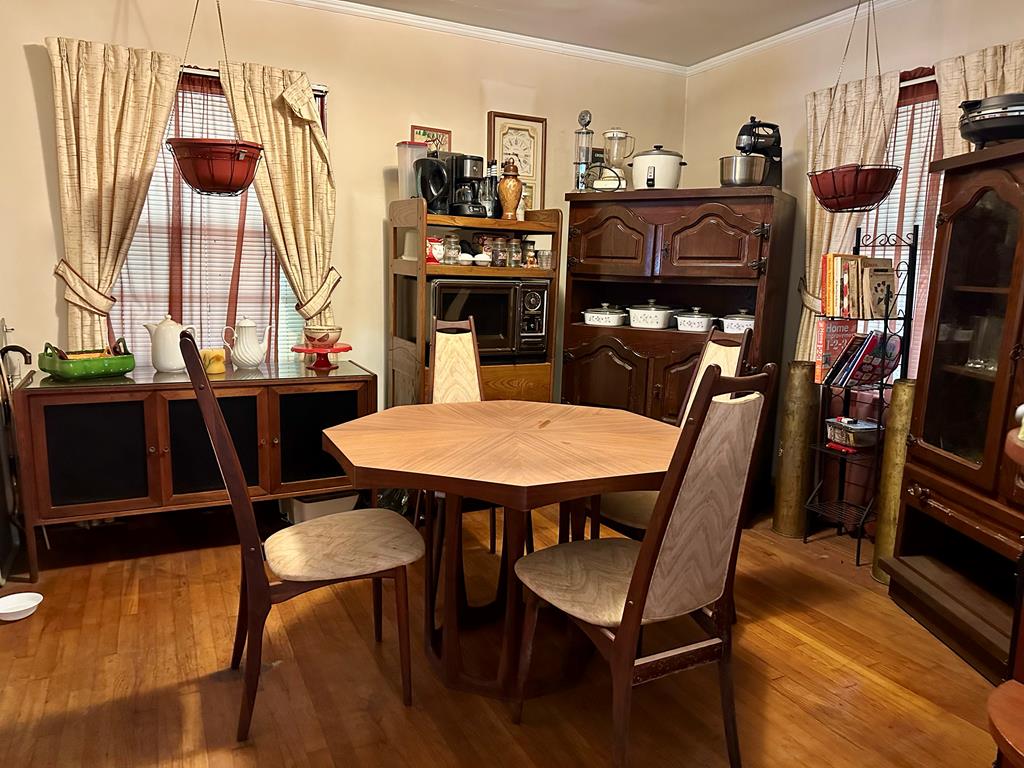 3042 Colonial Drive Columbus, GA 31903 - Photo 10 of 29 a view of a dining room with furniture and wooden floor