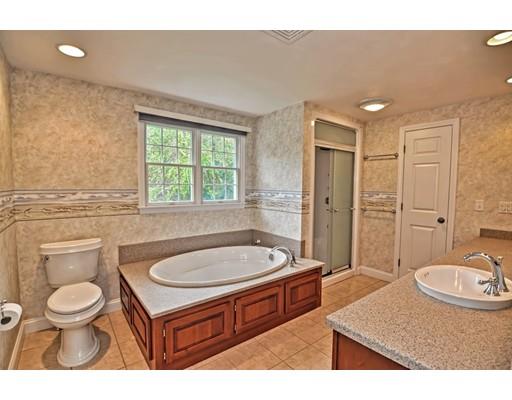 11 Great Bend Road Sandwich, MA 02537 - Photo 21 of 30 a bathroom with a sink a toilet a mirror and tub