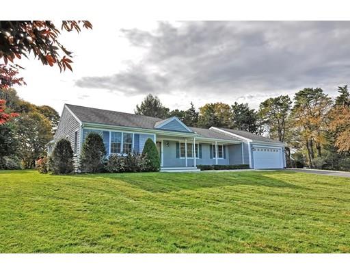 11 Great Bend Road Sandwich, MA 02537 - Photo 4 of 30 a view of a house with a big yard and potted plants