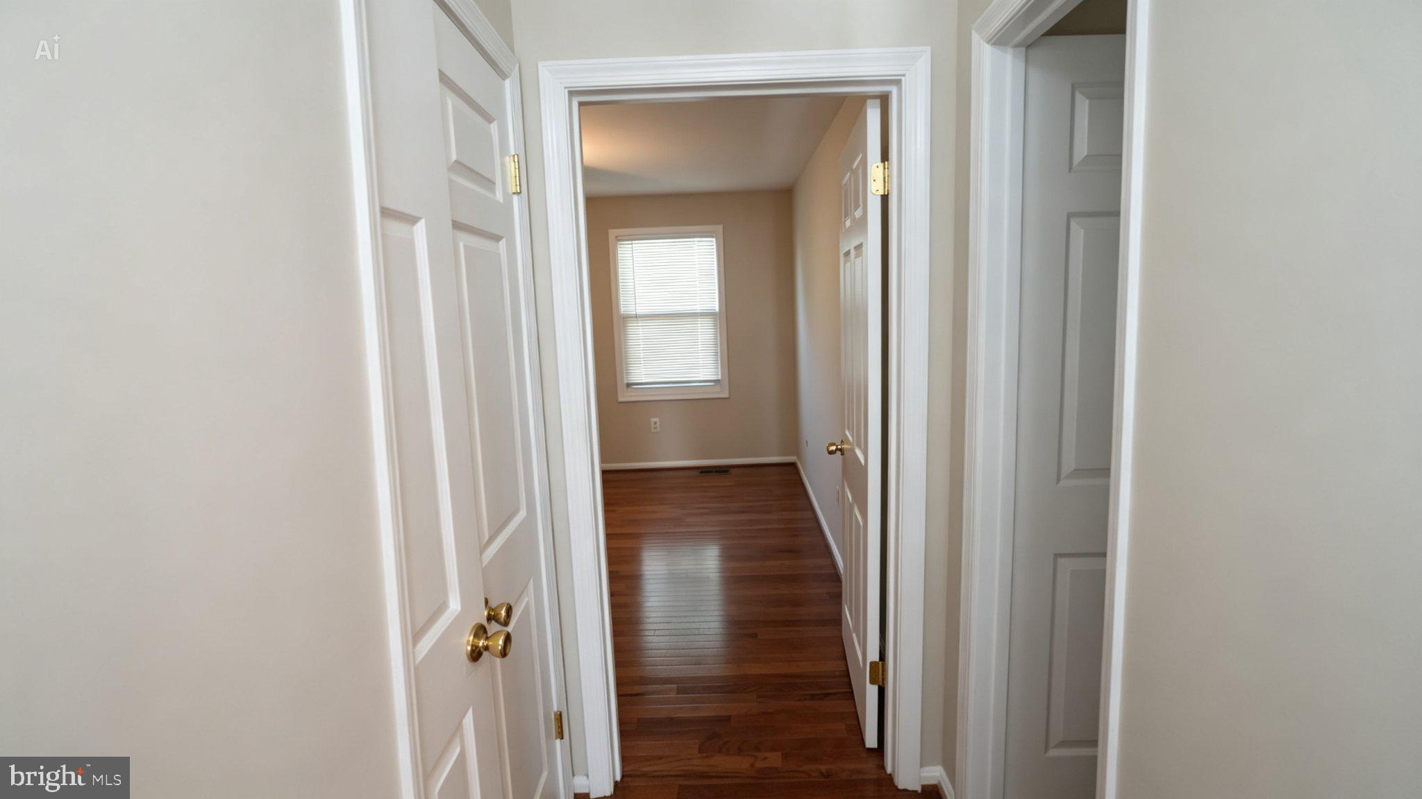 1602 Sundew Court Bowie, MD 20721 - Photo 18 of 31 Inviting hallway with warm wood floors.