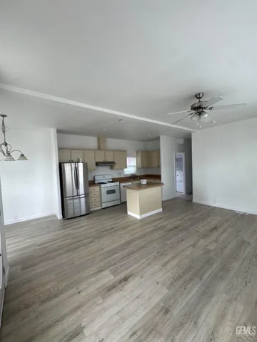 a view of kitchen with wooden floor
