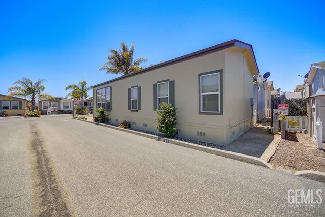a view of a house with a street