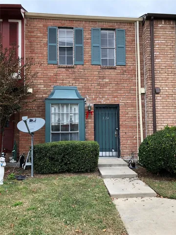a front view of a house having yard