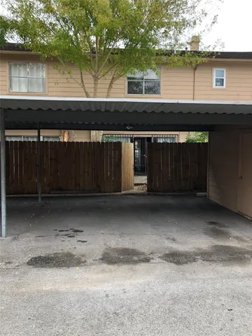 a couple of table and chairs sitting in a lake
