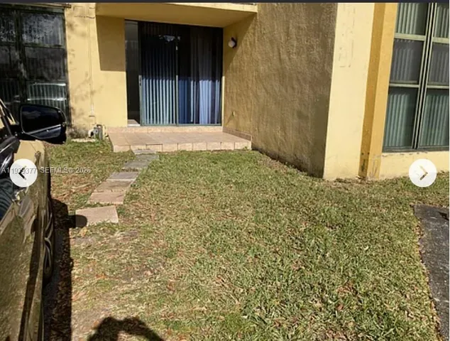 a view of a door front of a house