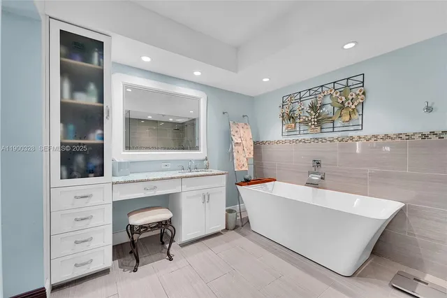 a bathroom with a sink and a bathtub