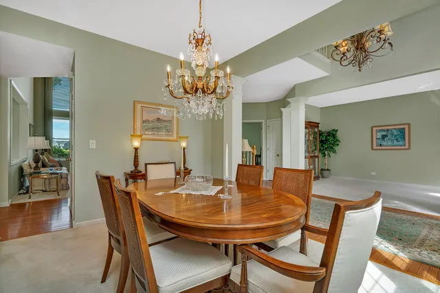 a bathroom with a granite countertop shower and a toilet