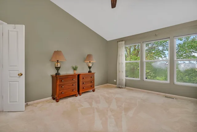 a view of a house with backyard porch and sitting area