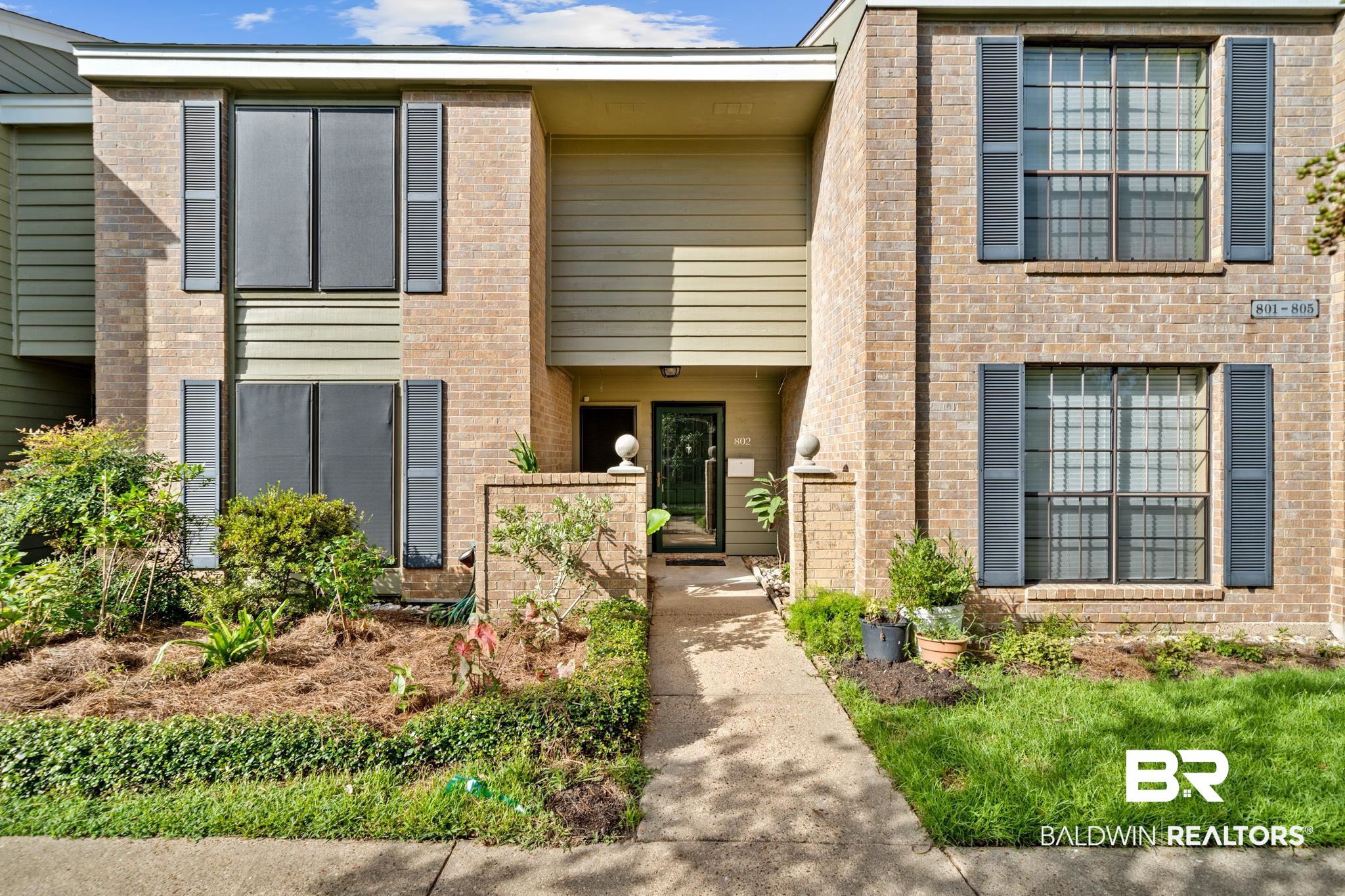 2901 Grant Street, Unit 802 Mobile, AL 36606 - Photo 3 of 37 Townhome / multi-family property featuring a balcony
