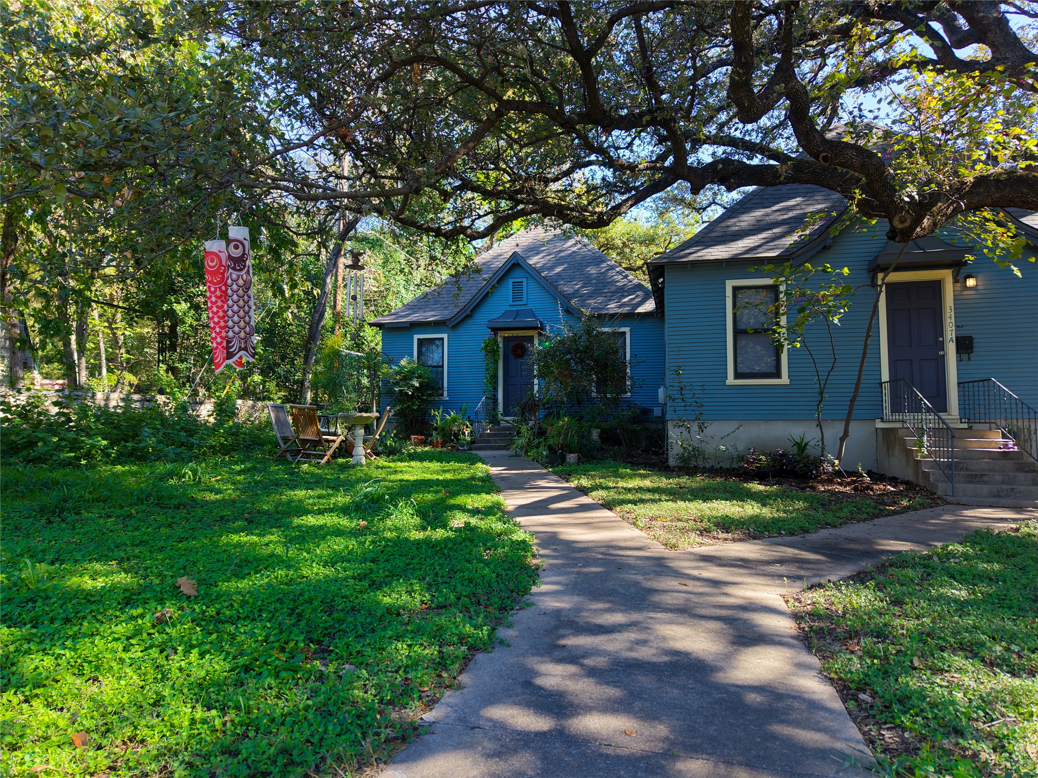 3407 Hampton Road, Unit A AND B Austin, TX 78705 - Photo 5 of 14 a front view of a house with garden