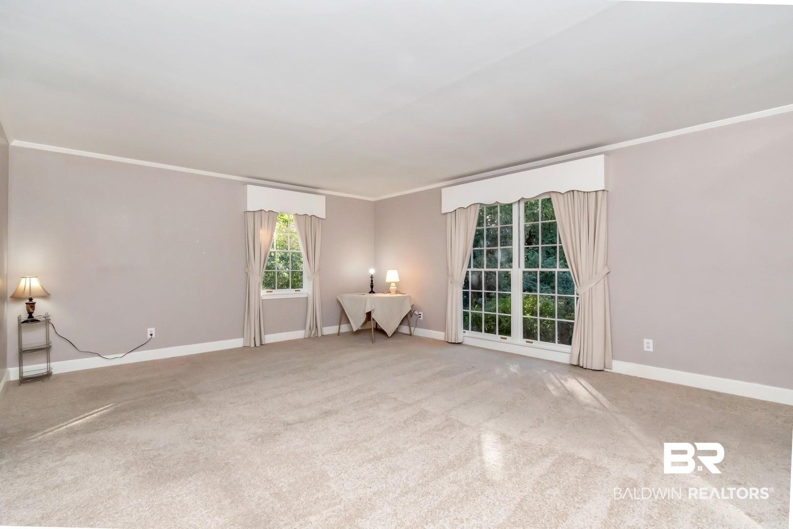 308 Brawood Drive Mobile, AL 36608 - Photo 3 of 33 Carpeted spare room featuring crown molding