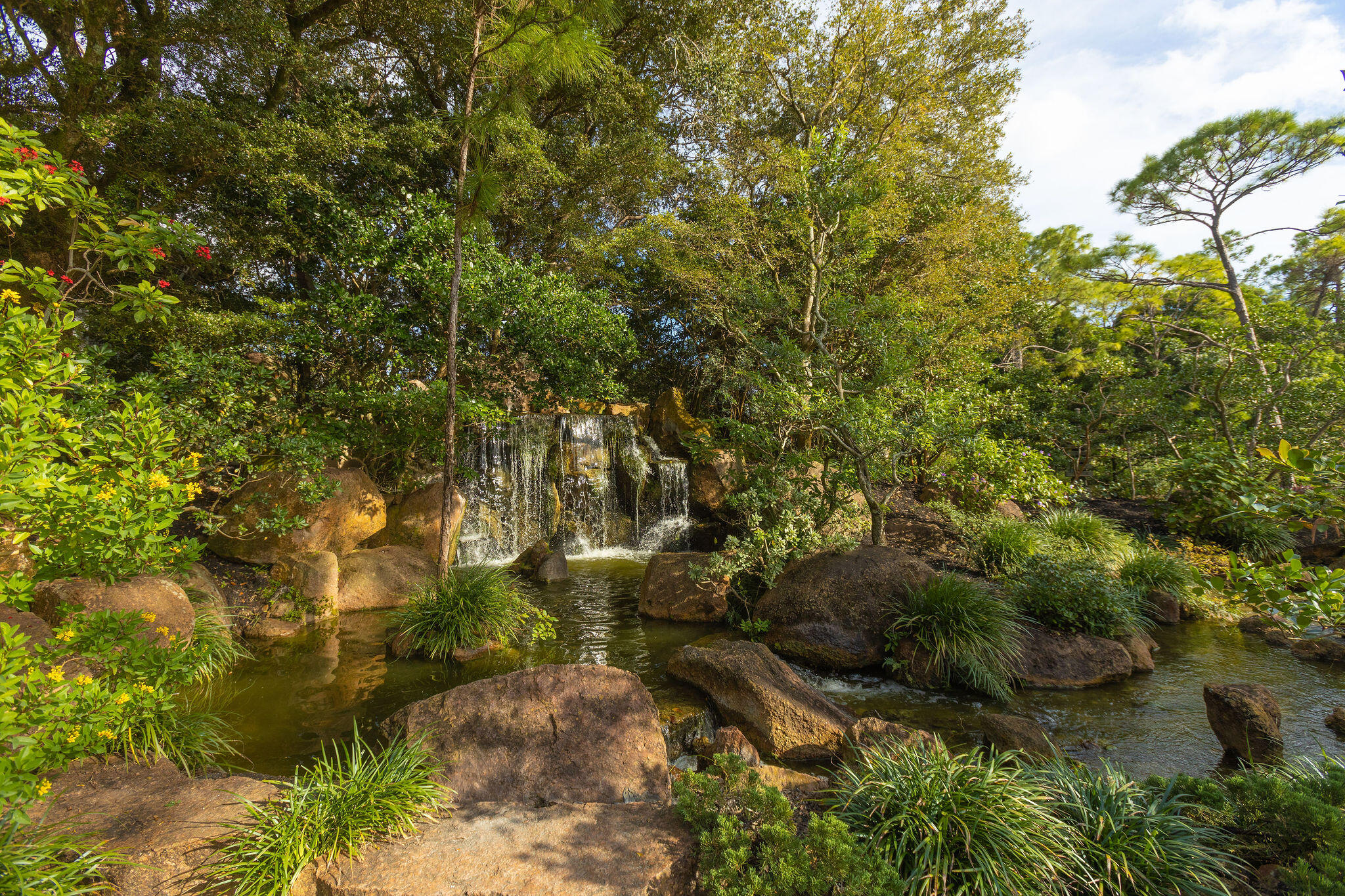 299 Southwest 7th Street, Unit 1040 Boca Raton, FL 33432 - Photo 22 of 31 a view of a yard