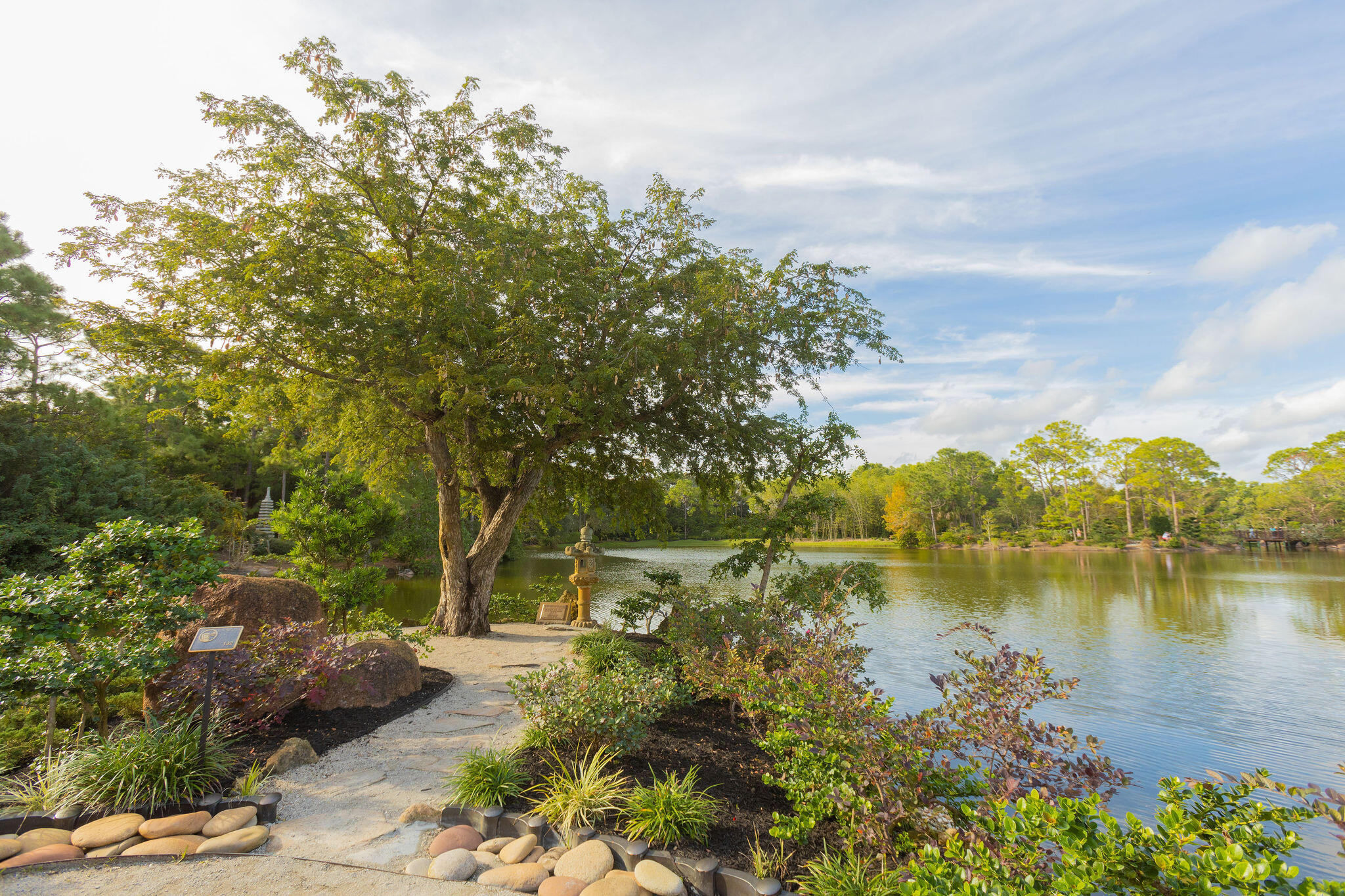 299 Southwest 7th Street, Unit 1040 Boca Raton, FL 33432 - Photo 23 of 31 a view of a lake with houses