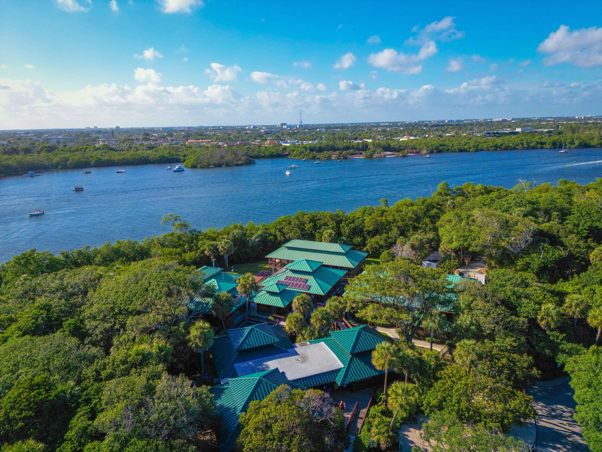 299 Southwest 7th Street, Unit 1040 Boca Raton, FL 33432 - Photo 31 of 31 an aerial view of residential houses with outdoor space and trees