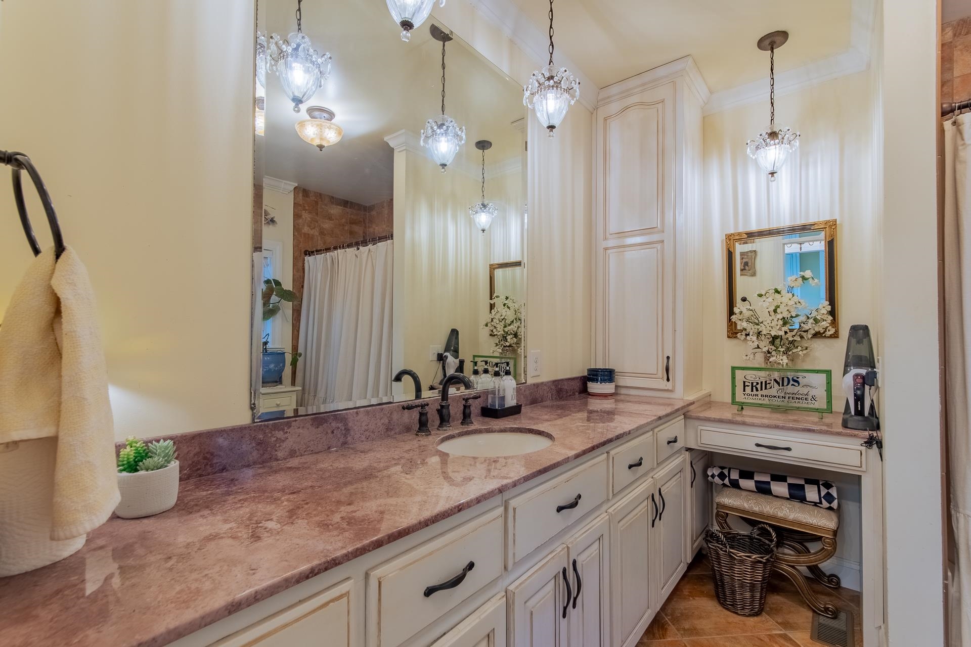 4083 57th Highway West Ramer, TN 38367 - Photo 13 of 40 a bathroom with a sink double vanity and a mirror