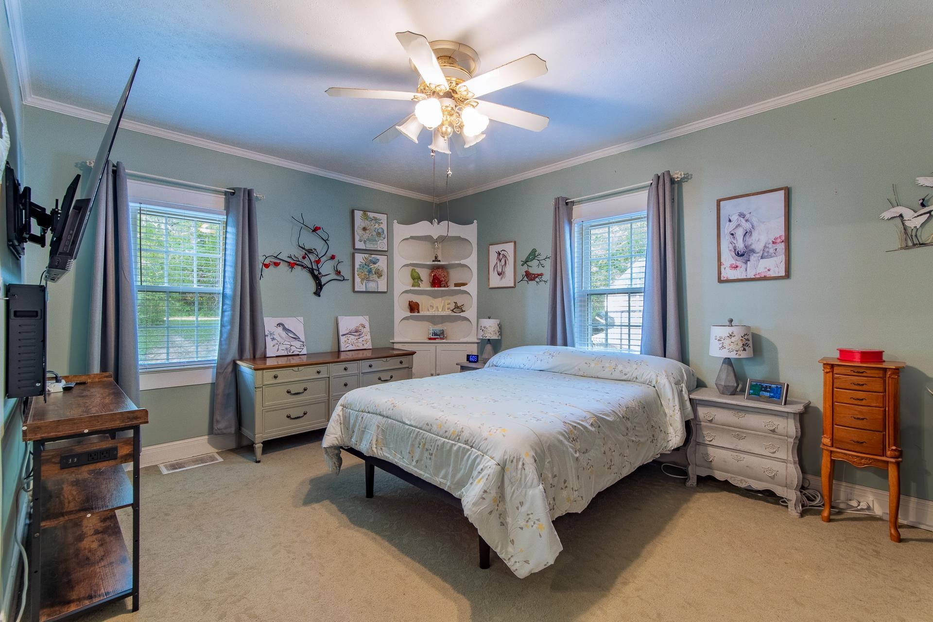 4083 57th Highway West Ramer, TN 38367 - Photo 15 of 40 a bedroom with a bed and a desk