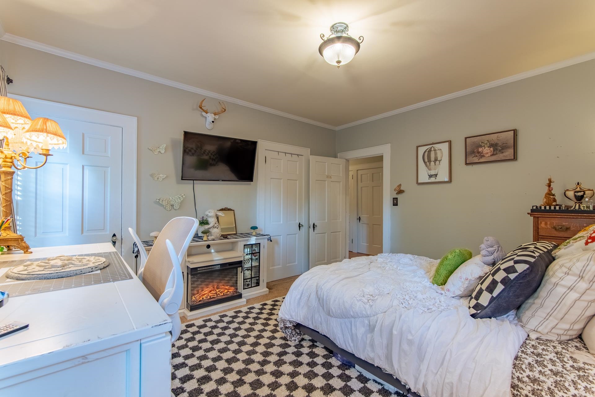 4083 57th Highway West Ramer, TN 38367 - Photo 17 of 40 a bedroom with a bed and a flat screen tv