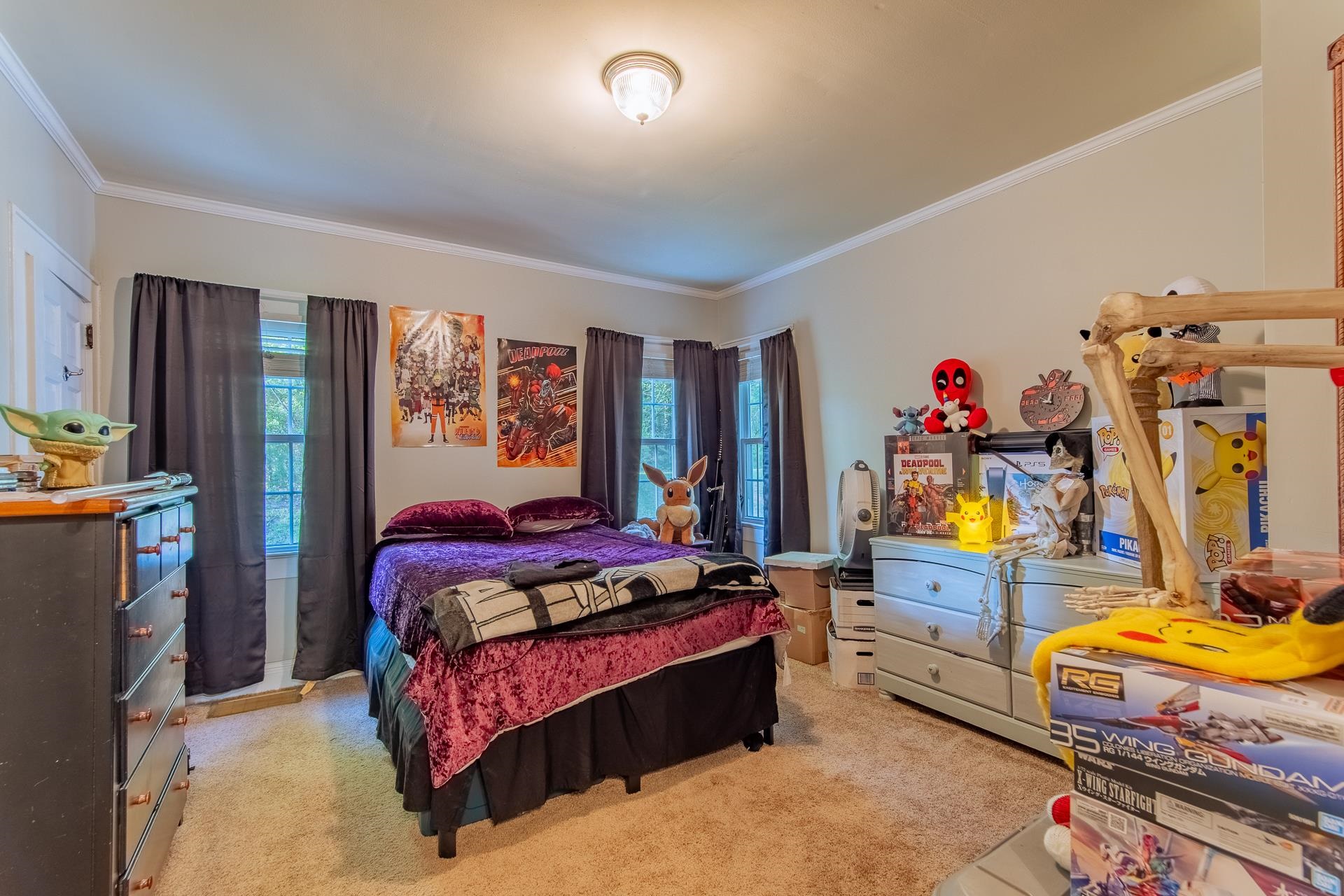 4083 57th Highway West Ramer, TN 38367 - Photo 19 of 40 a bedroom with bed and wooden floor