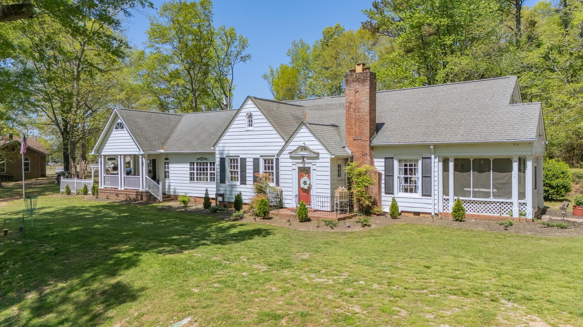 4083 57th Highway West Ramer, TN 38367 - Photo 2 of 40 a view of a house with a yard patio and sitting area