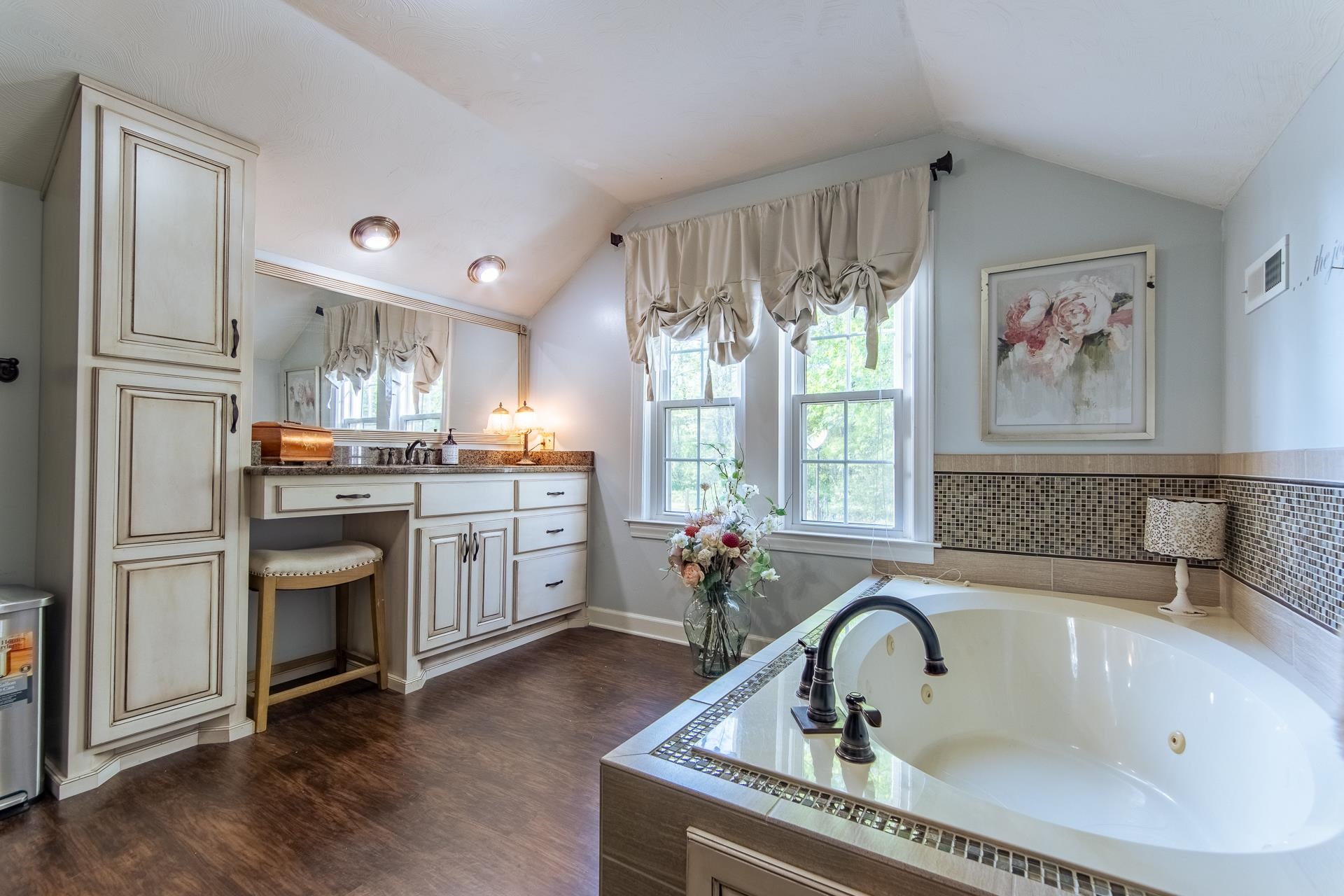 4083 57th Highway West Ramer, TN 38367 - Photo 23 of 40 a kitchen with granite countertop a stove a sink and a refrigerator