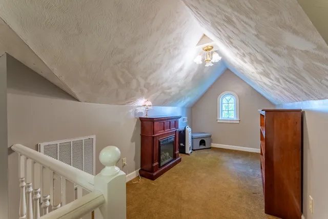 a view of livingroom with furniture and fireplace