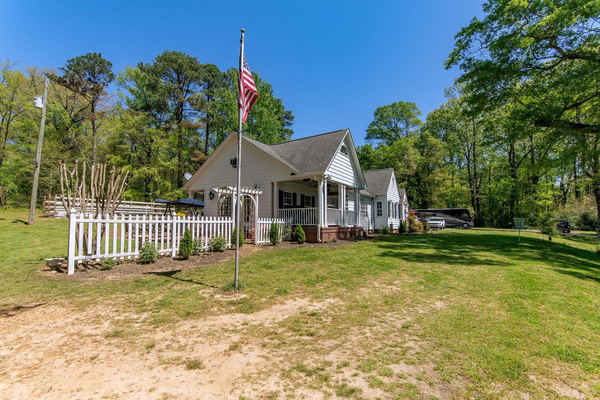 4083 57th Highway West Ramer, TN 38367 - Photo 31 of 40 a front view of a house with a yard