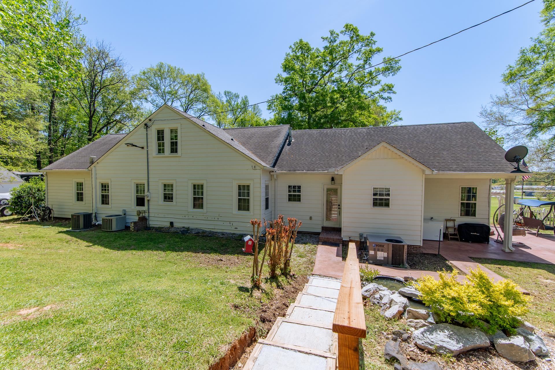 4083 57th Highway West Ramer, TN 38367 - Photo 34 of 40 a view of a house with backyard and sitting area