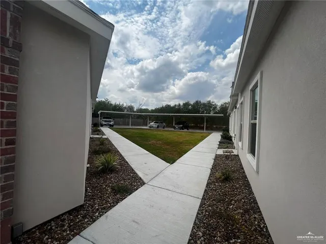 a view of swimming pool with a yard