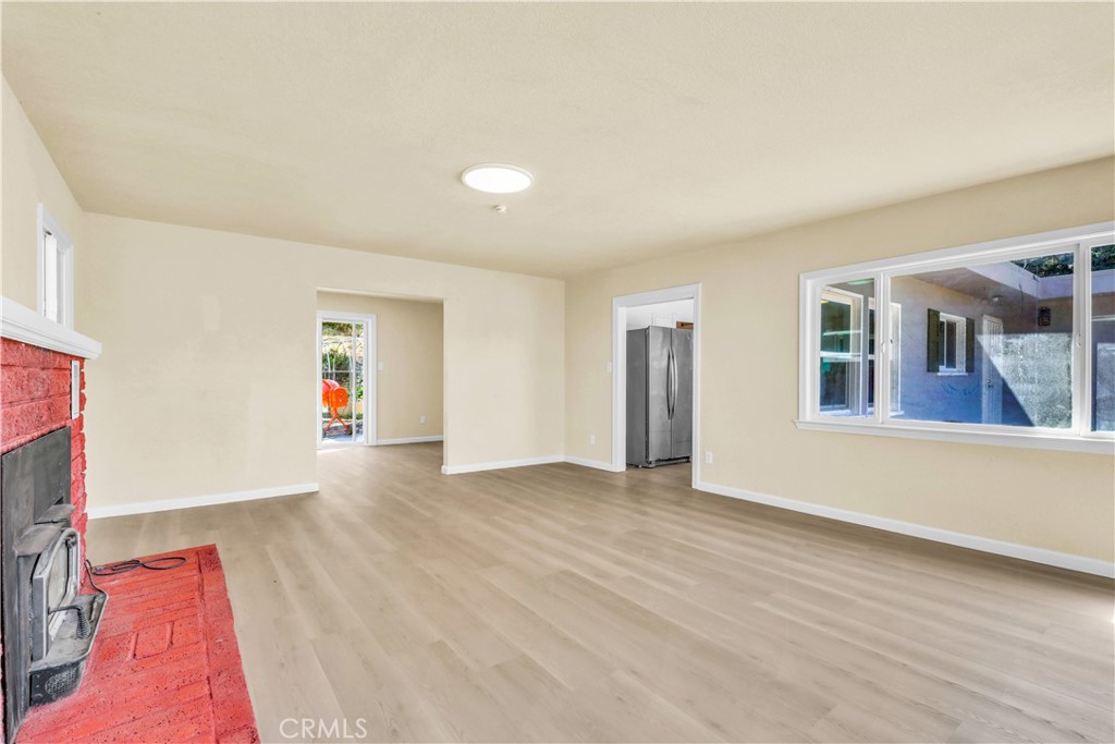 15905 Kugelman Street Lower Lake, CA 95457 - Photo 67 of 75 a view of an empty room with window and wooden floor