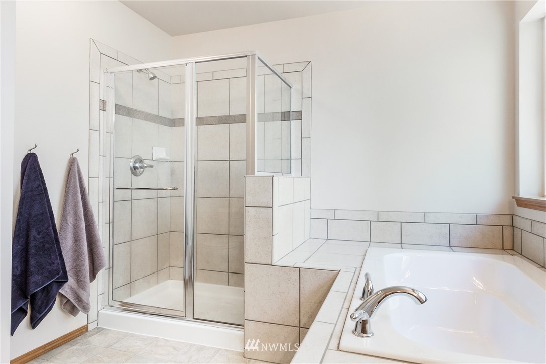 16008 Sunset Road Bothell, WA 98012 - Photo 17 of 28 a bathroom with a shower