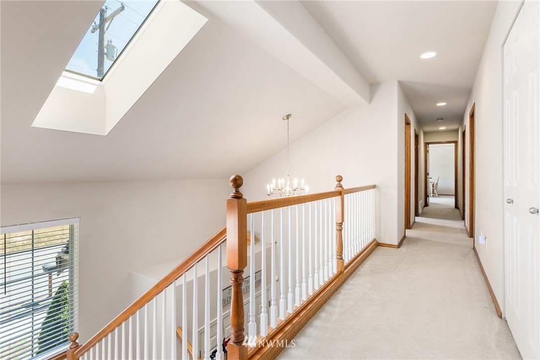 16008 Sunset Road Bothell, WA 98012 - Photo 21 of 28 a view of a hallway with stairs