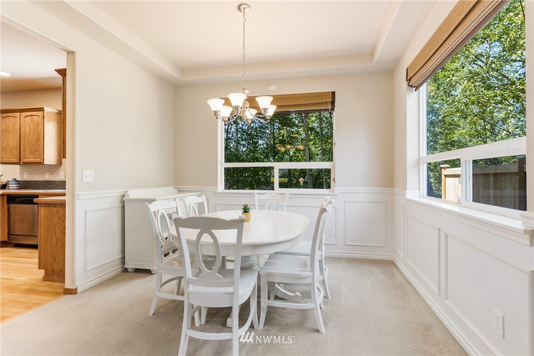 16008 Sunset Road Bothell, WA 98012 - Photo 9 of 28 a view of a dining room with furniture window and outside view